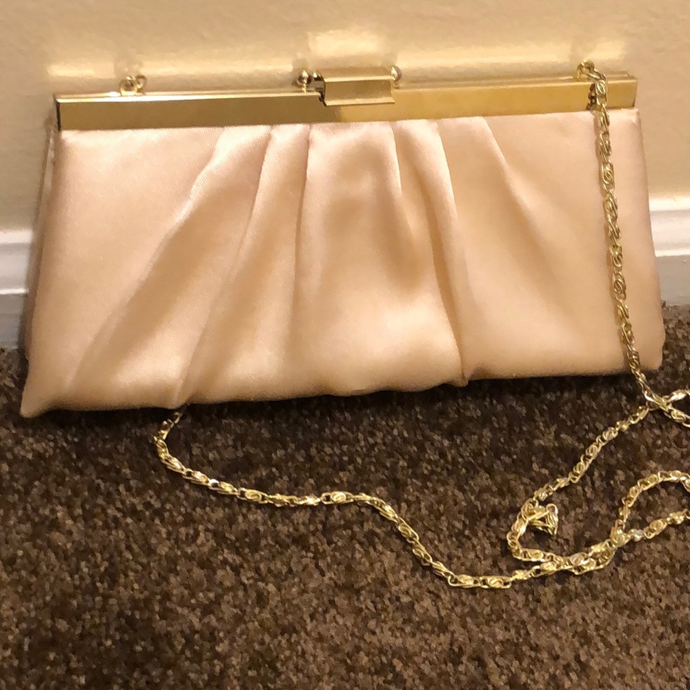 Gold tone clutch evening bag